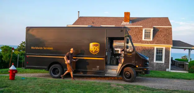 UPS to cut 12,000 jobs, says package volume slipped last quarter