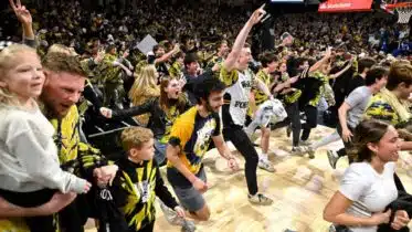 College coaches, leaders call for court-storming regulations